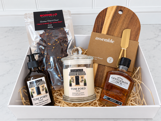 The After Hours Gift Box with SZOFI & CO candle and hand & body wash, Gentleman Jack whiskey, chilli jerky and acacia board set