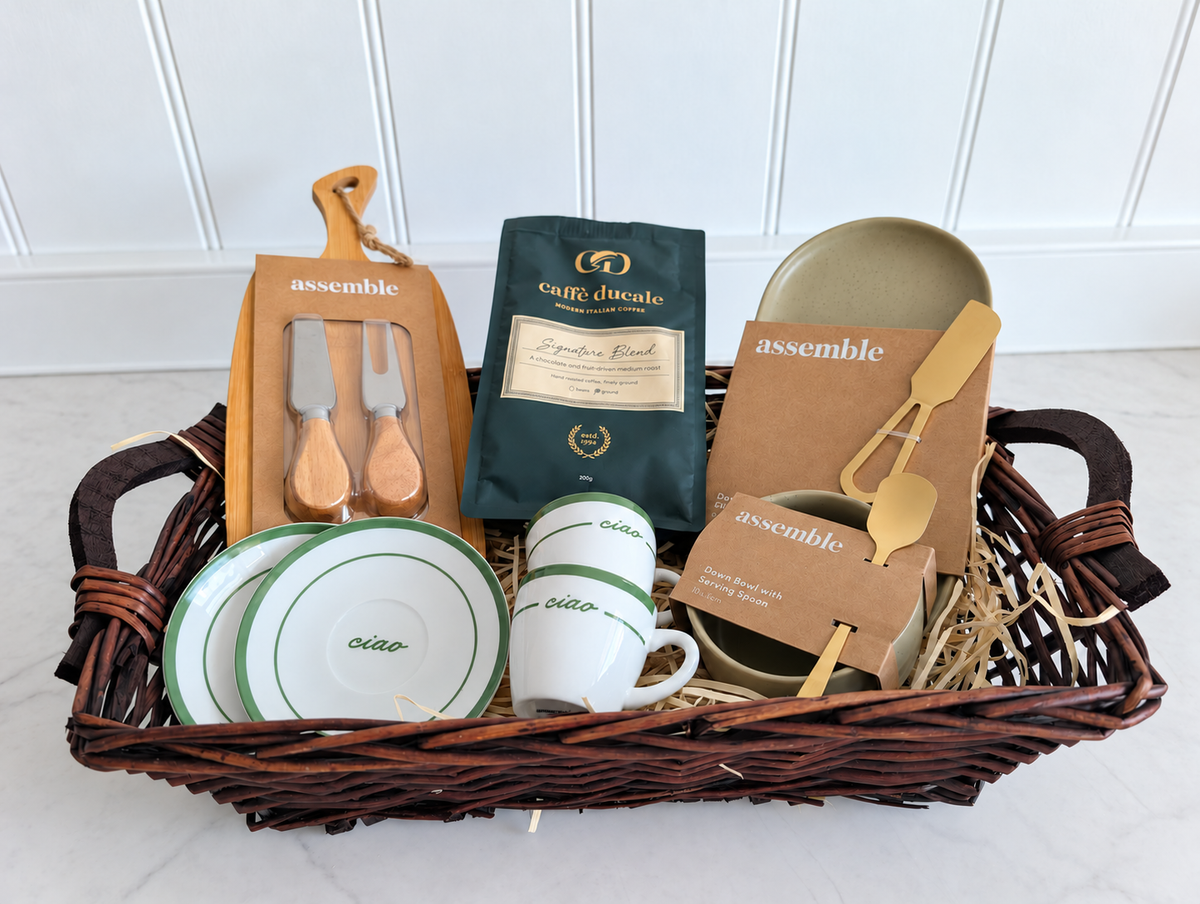 The Ciao & Coffee Hamper in its brown willow tray with coffee, espresso cups and saucers and serving pieces