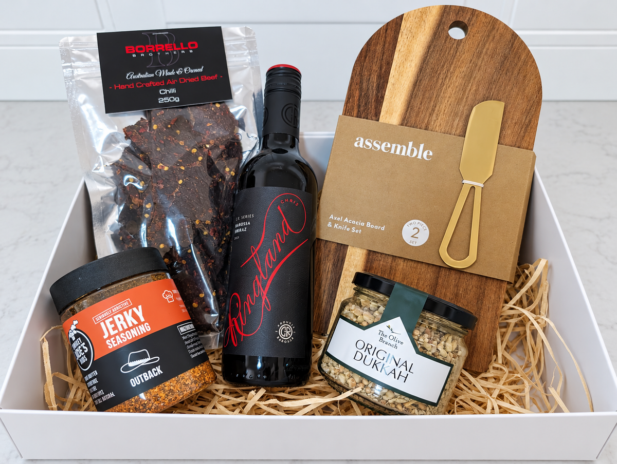 The Shiraz & Savour Gift Box with Chris Ringland Shiraz, chilli jerky, Outback seasoning, dukkah and an acacia board set