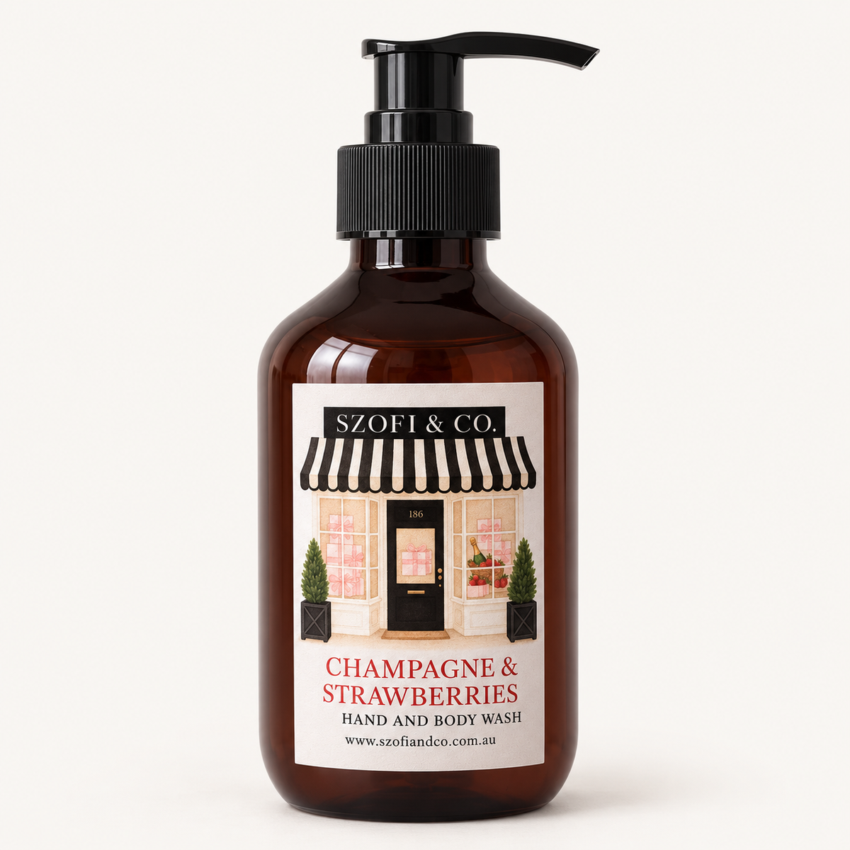SZOFI & CO Champagne & Strawberries Hand and Body Wash in an amber pump bottle on a warm ivory background