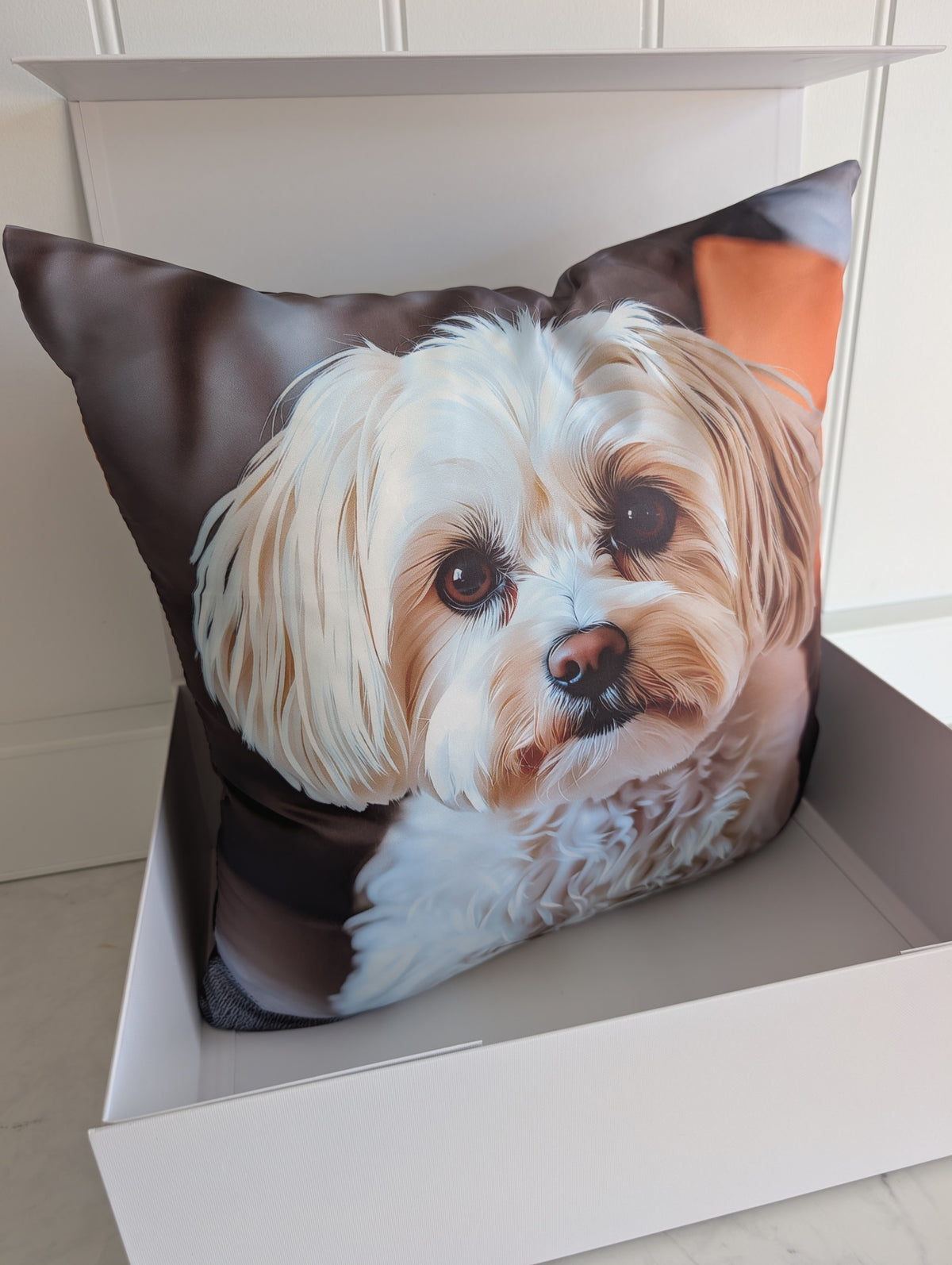 White Puppy Standing cushion — angled view in gift box